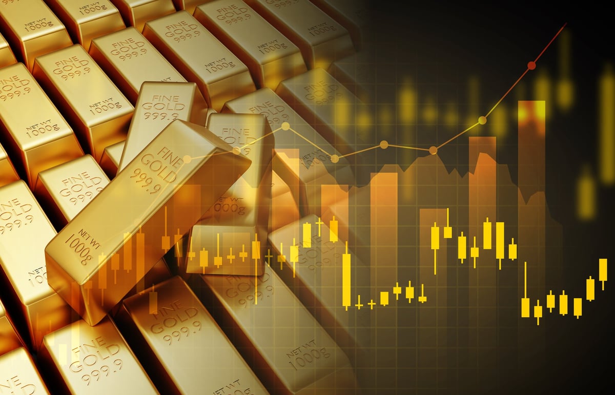 Gold trading, gold bars with stock graph chart stock.